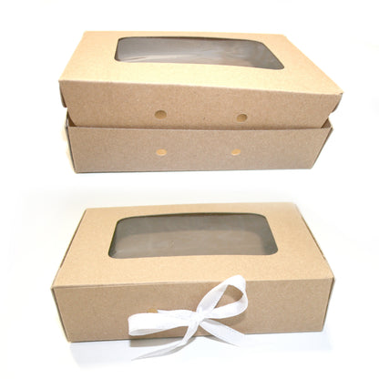 Two brown cardboard boxes with clear windowed tops on a white background