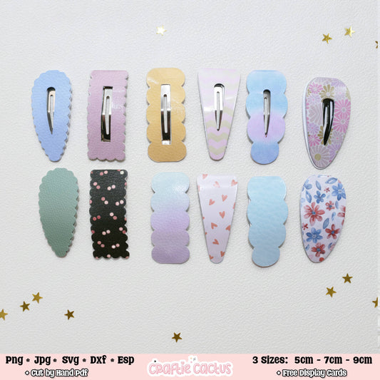Ten pastel hair claw clips arranged in two rows on a white textured background with small gold star accents. The clips come in multiple colors and patterns, including solid light blue, lavender, mint green, black with pink dots, pastel gradient, pink with heart prints, and floral prints.