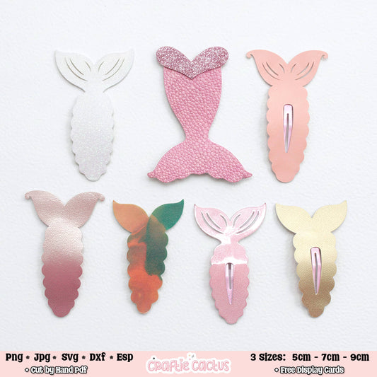 Six mermaid tail shaped display cards or stickers shown on a white background, with file format text and size information along the bottom. The tails come in white, pink glitter, peach, pink-to-rose gradient, green-to-orange gradient, light pink, and pale gold designs.